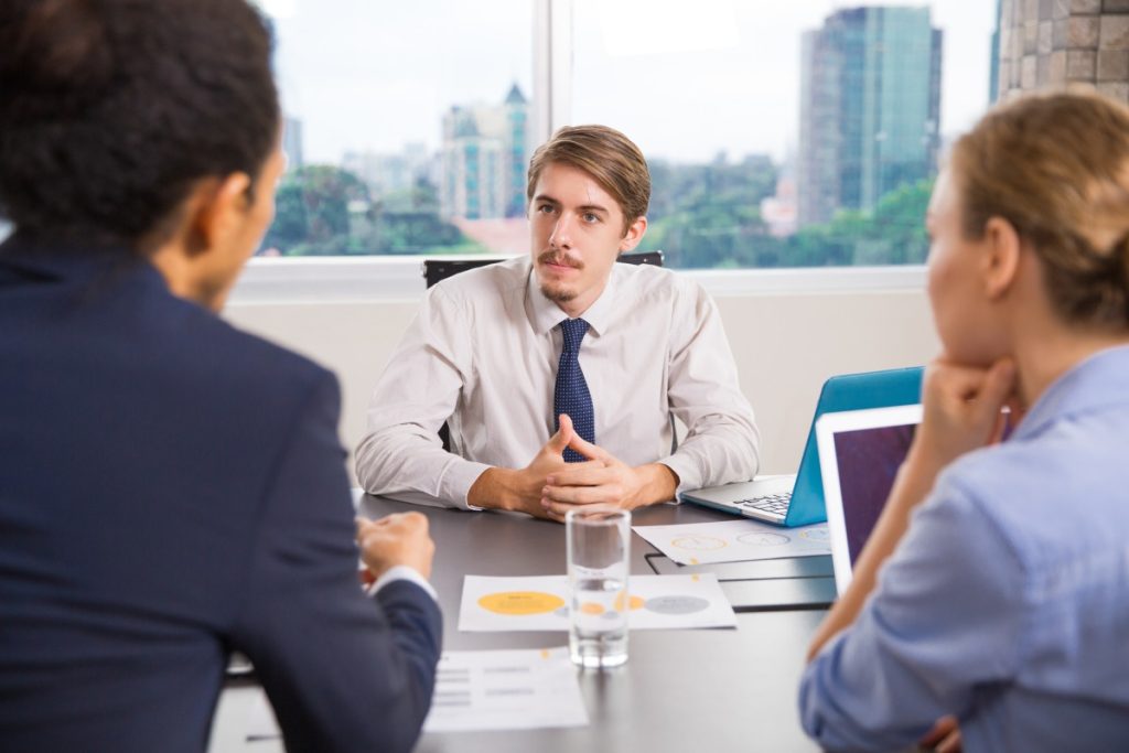 Nevada business owner meeting with a contract attorney after a commercial agreement was breached.