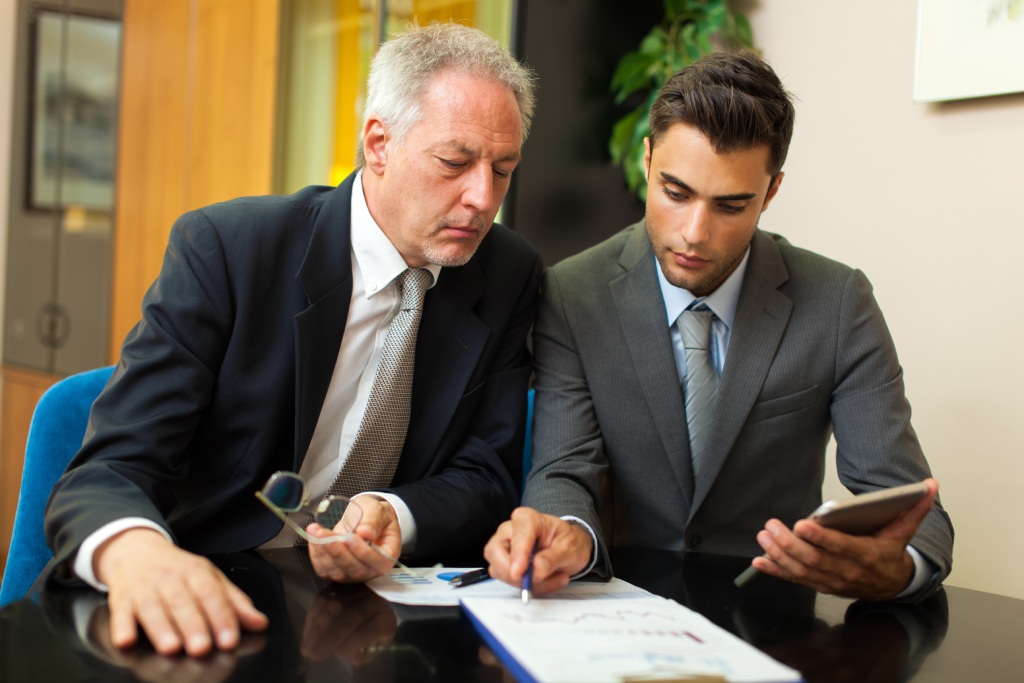 Business owner consulting a Nevada attorney about protecting personal assets from business liabilities.