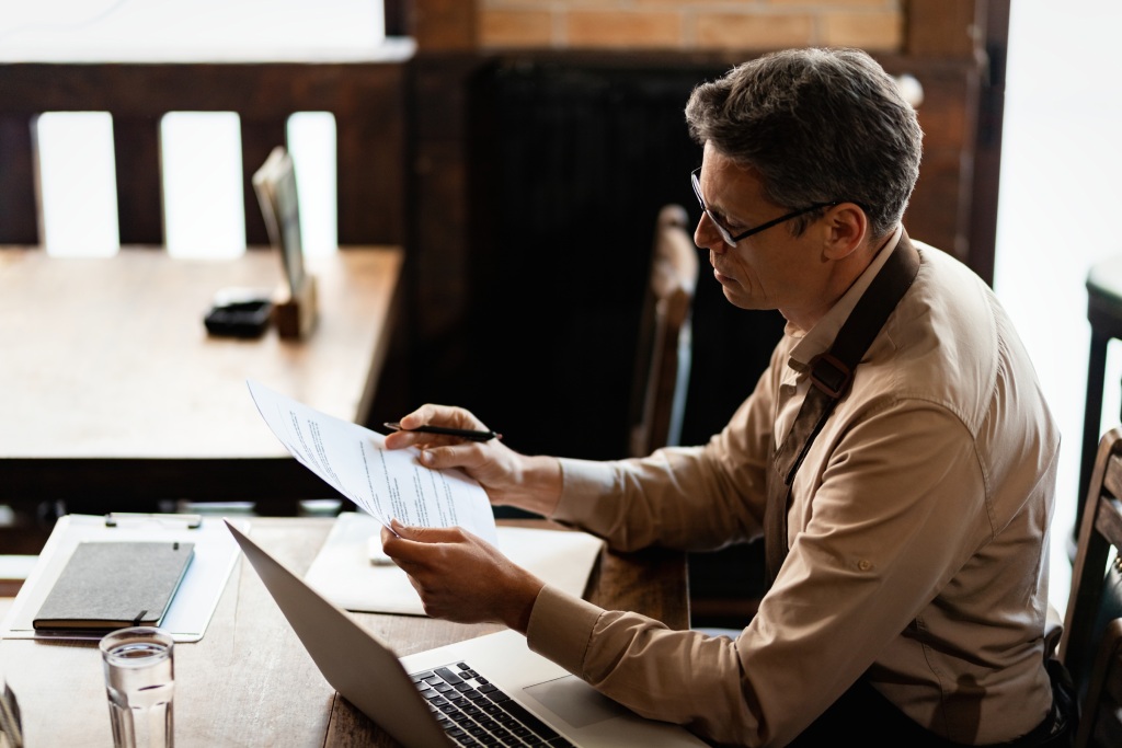 Business owner completing Nevada business registration and licensing compliance checklist.