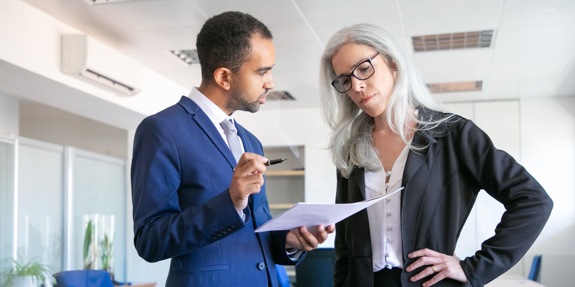 Business attorney explaining the key terms of an independent contractor agreement to a Nevada business owner.