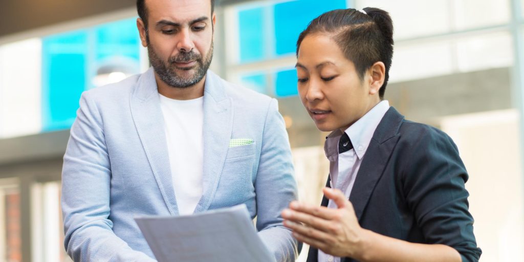 Nevada business owner reviewing state business license and registration requirements with a business attorney.