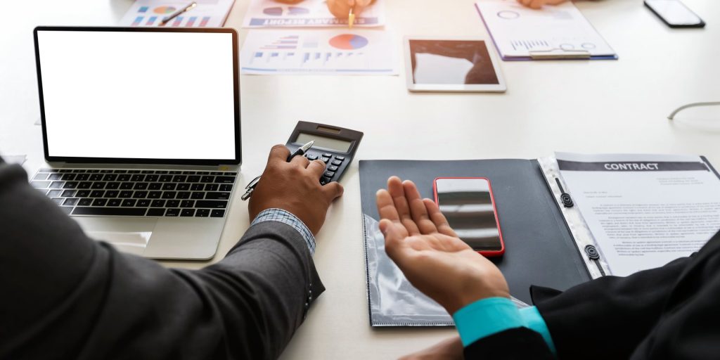 Nevada business owner reviewing cash flow and debt obligations during financial distress