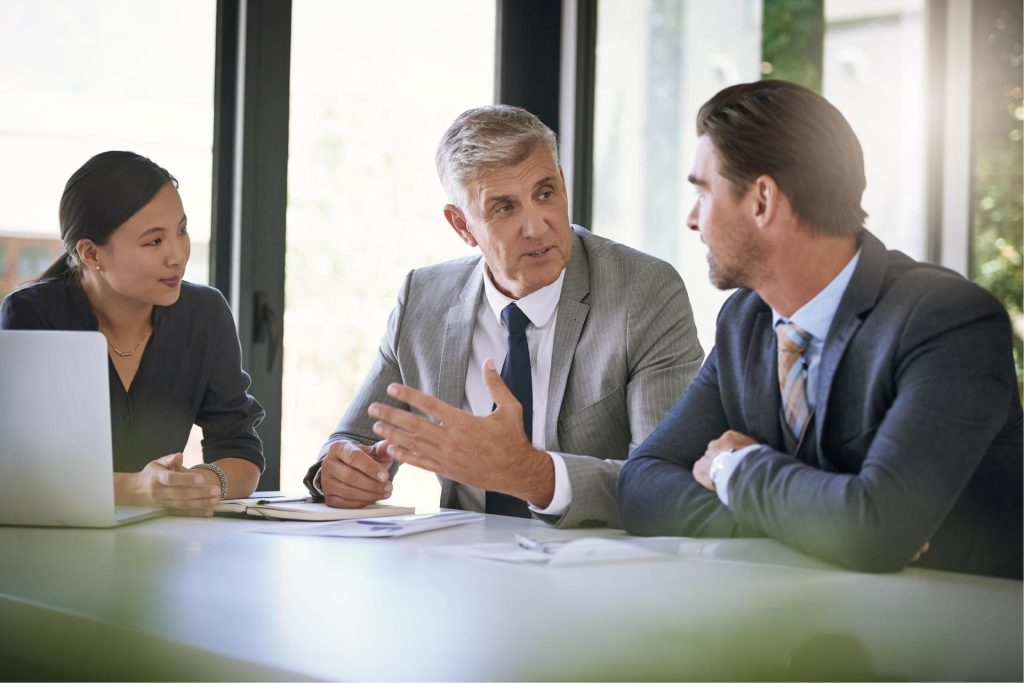 Business partners discussing joint venture exit and termination provisions in Nevada