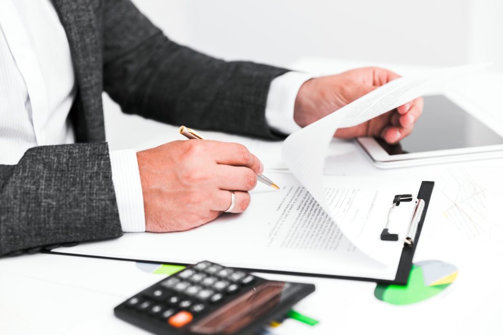 Business due diligence documents being reviewed for potential fraud and misrepresentation in Nevada