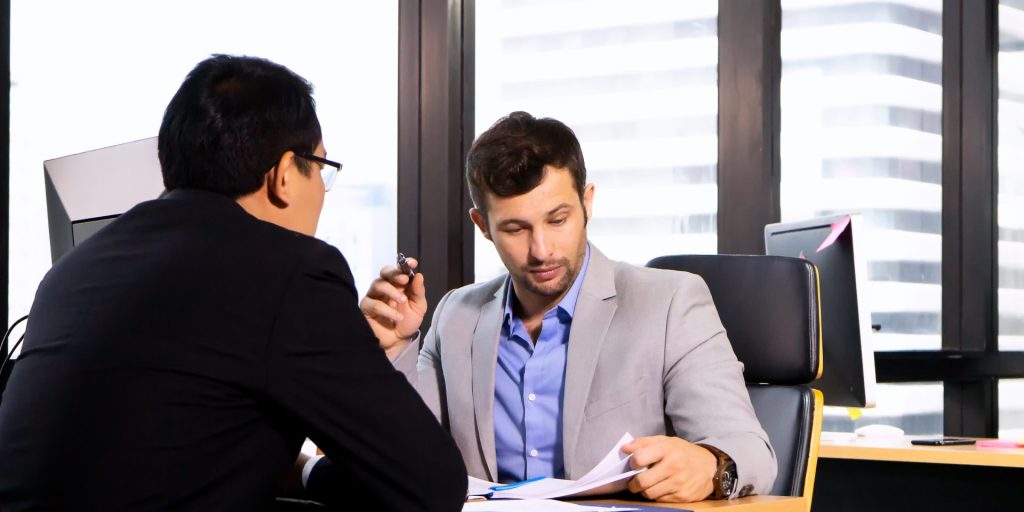 Business attorney explaining personal guarantee provisions in a Nevada business loan agreement.