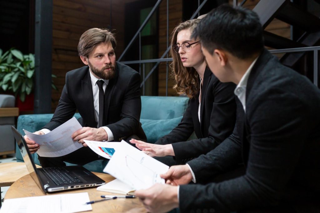 Business partners reviewing shared ownership and an LLC operating agreement in Nevada