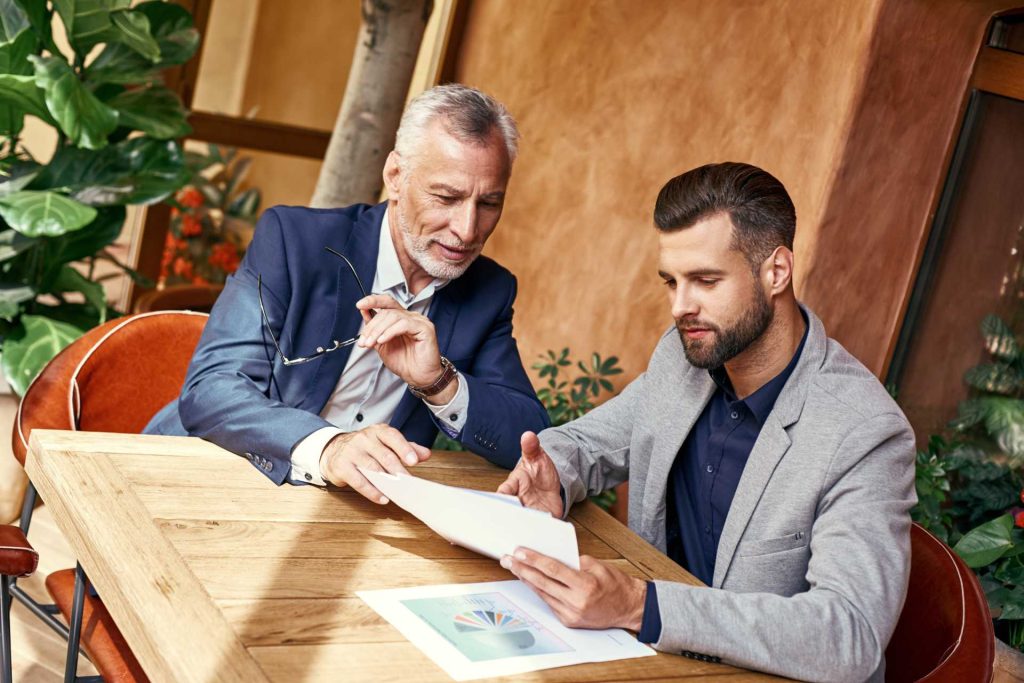 Entrepreneur discussing Nevada and Delaware business formation options with an attorney