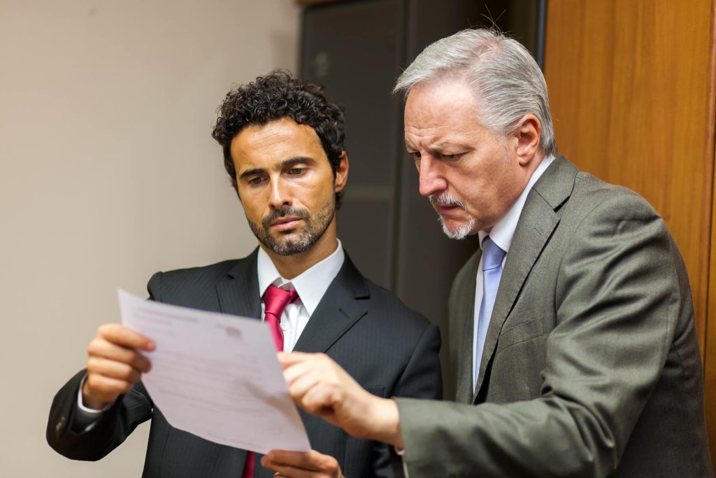 Nevada business attorney reviewing a contract termination with a business owner