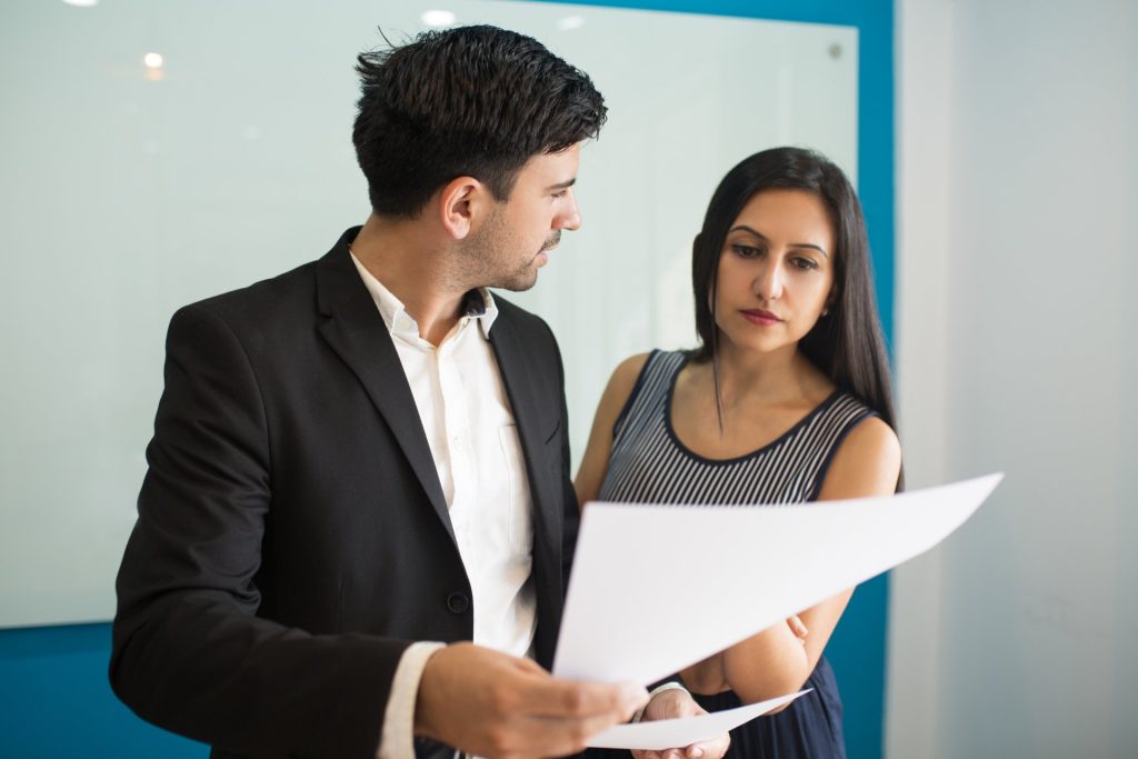 Las Vegas business lawyer reviewing a commercial lease and CAM reconciliation with a tenant