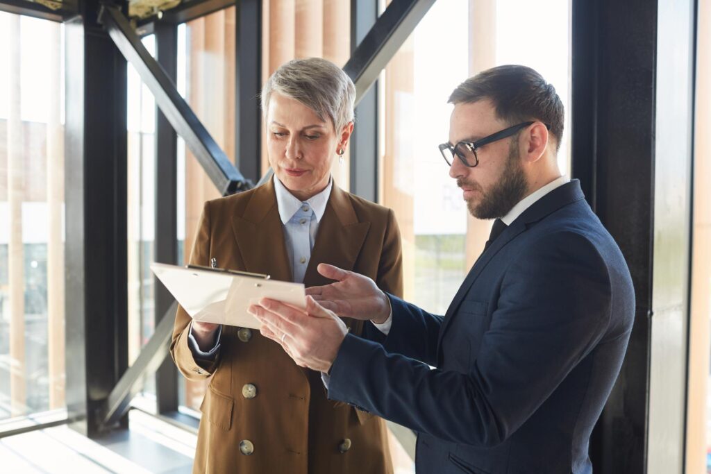 Las Vegas business owner reviewing a commercial contract with an attorney before signing