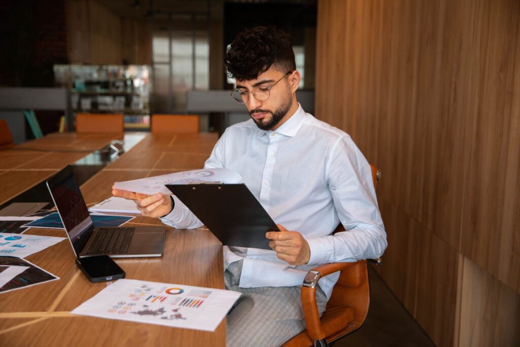 Las Vegas small business owner reviewing a commercial lease and partnership agreement