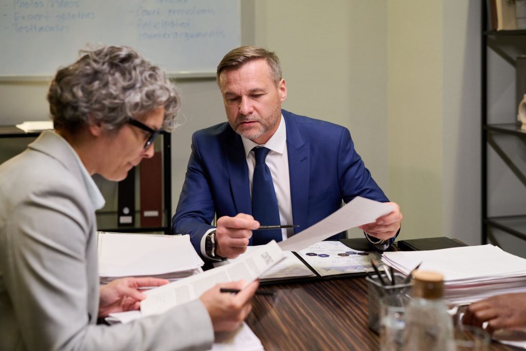 Attorney reviewing restrictive covenant terms in a Nevada business sale agreement