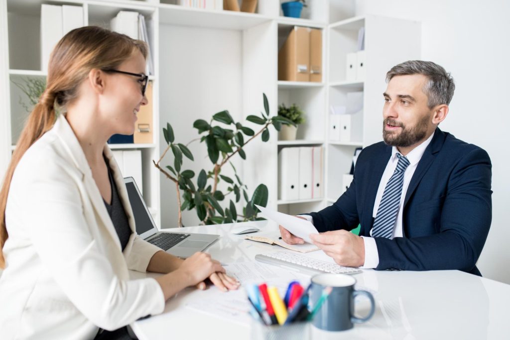 Nevada employer and legal counsel reviewing an employment discrimination charge and supporting records