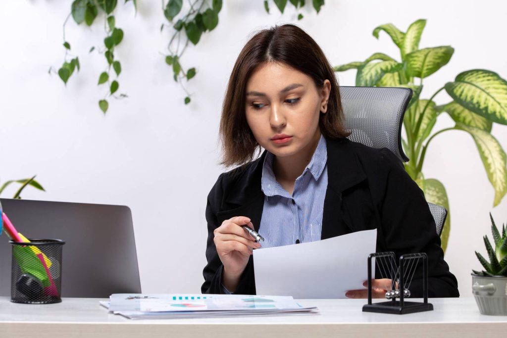 Nevada employer reviewing overtime records, employee break schedules, and final payroll calculations