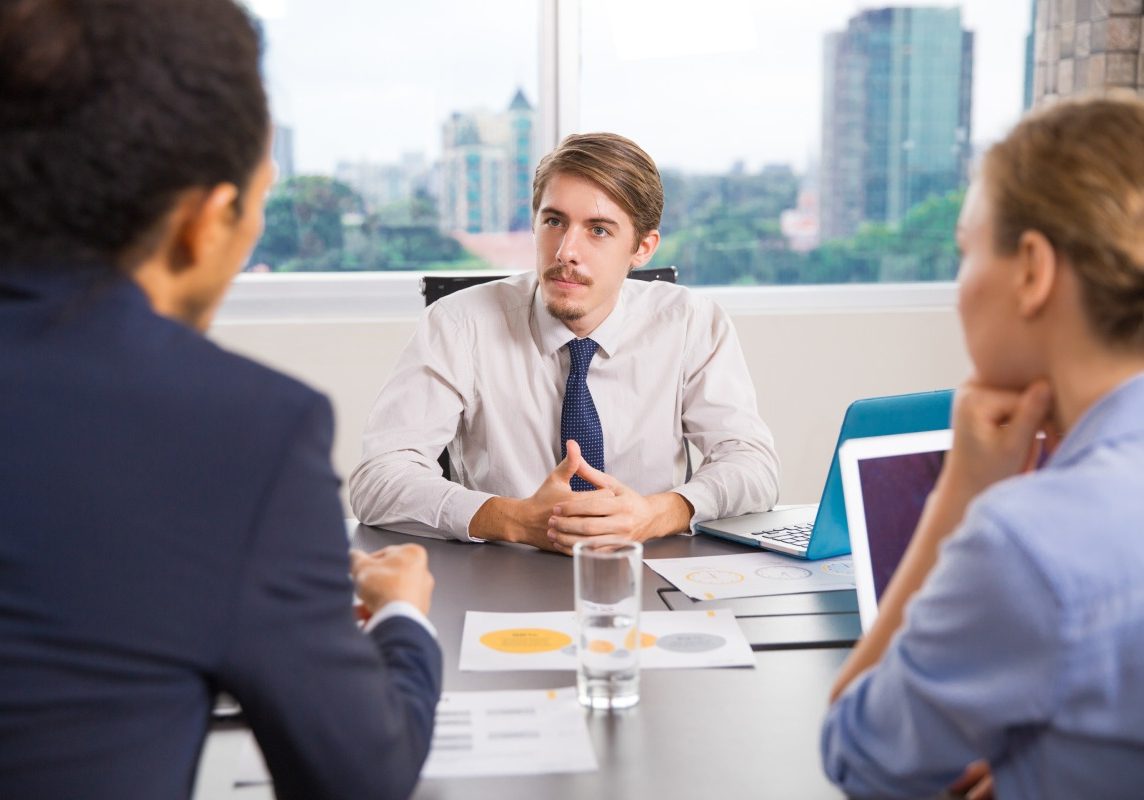Nevada business owner meeting with a contract attorney after a commercial agreement was breached.