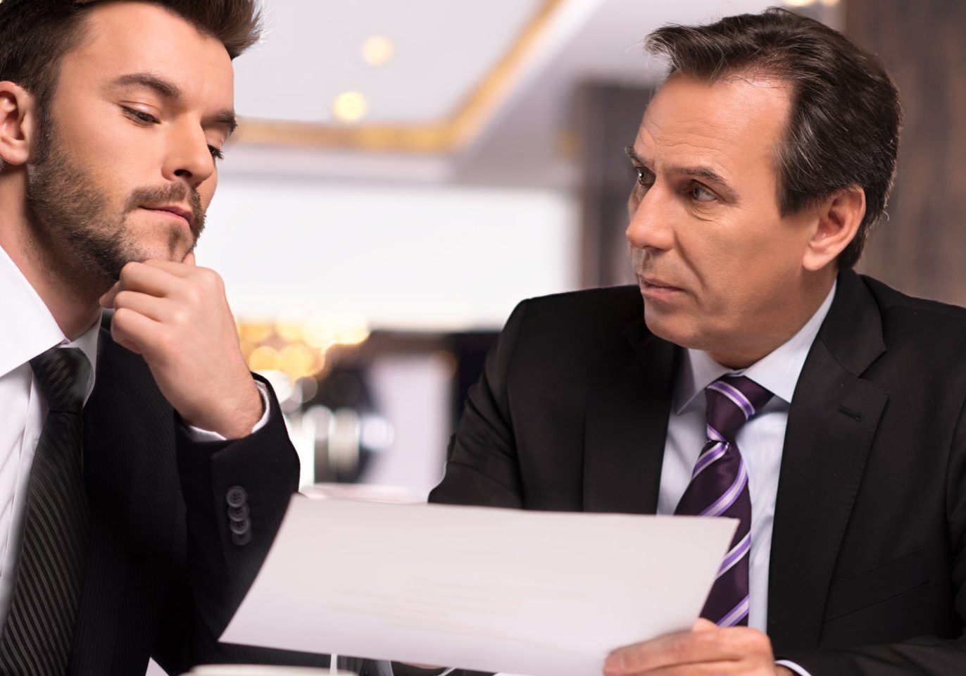 Nevada business owner reviewing common contract mistakes with an attorney