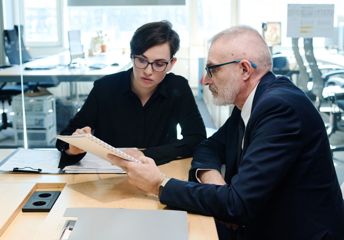 Nevada small business owner discussing LLC formation with a business attorney.