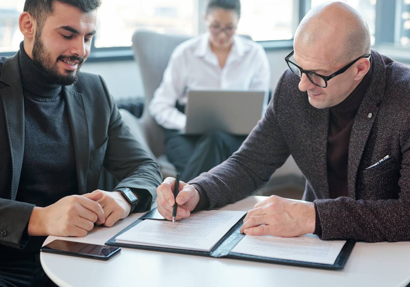 Nevada business attorney reviewing a legally binding business contract