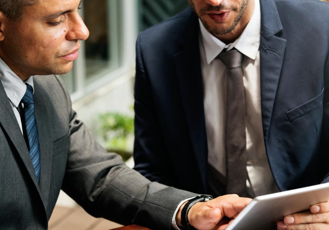 Nevada business owner reviewing a commercial contract with an attorney