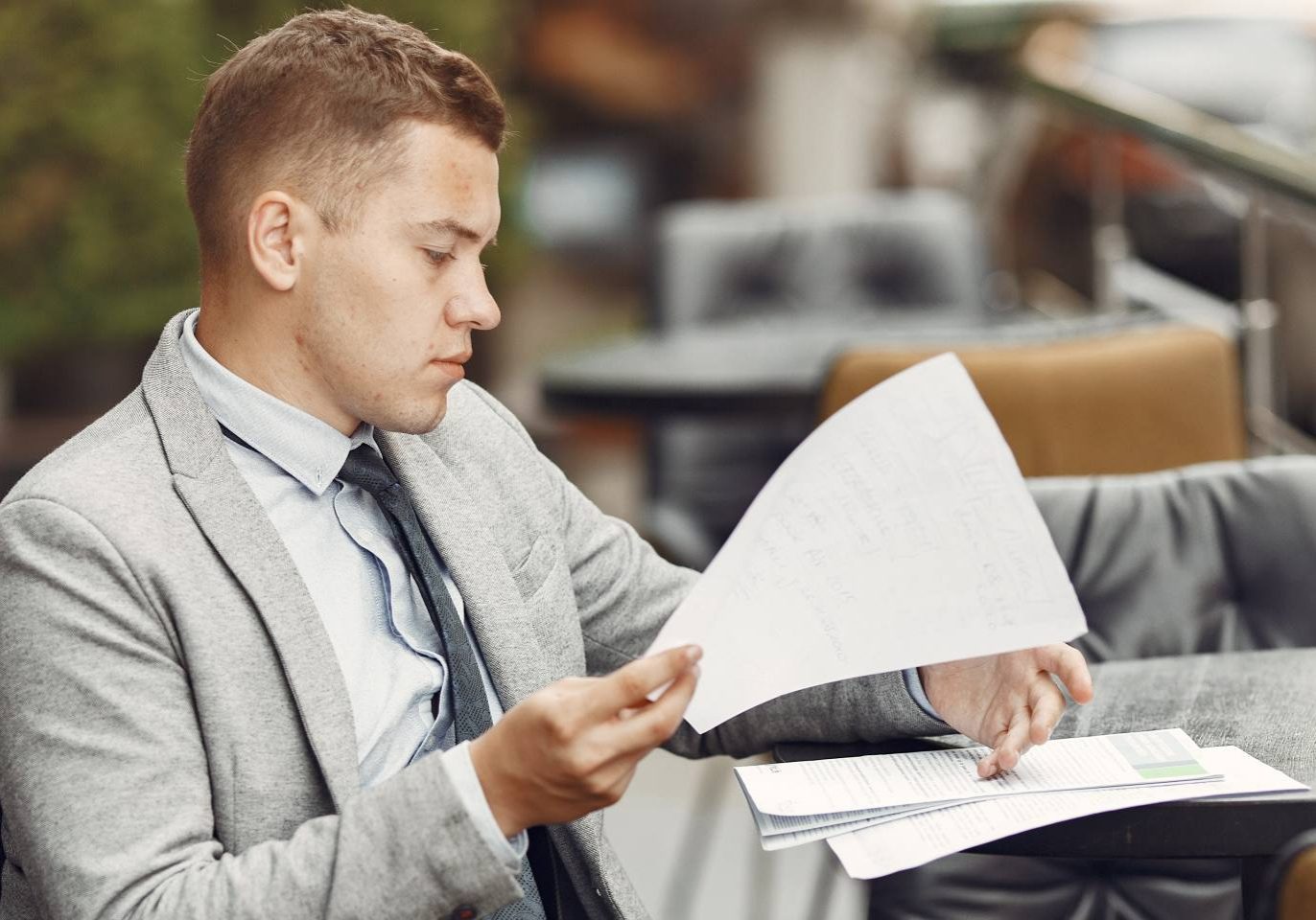 Nevada business owner reviewing corporate records and annual filing documents.
